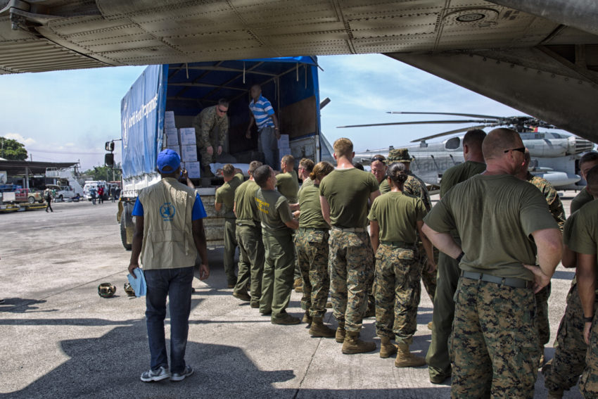 US Marines loading over 12 tonnes of food items into helicopters to be sent in Jeremie. Small towns all along the western part of Haiti suffered extreme damage from heavy winds and rains and on the coastal areas, storm surge. Hurricane Matthew passed over Haiti on Tuesday October 4, 2016, with heavy rains and winds. While the capital Port au Prince was mostly spared from the full strength of the class 4 hurricane, the western cities of Les Cayes and Jeremie received the full force sustaining wind and water damage across wide areas. Photo: Frederic Fath - UN/MINUSTAH