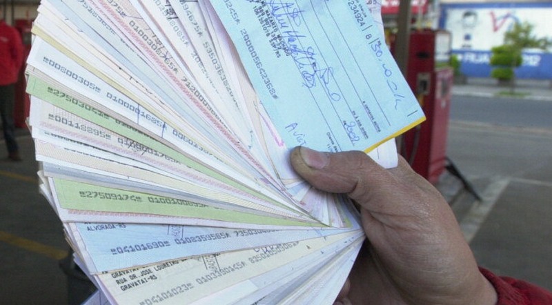 Em relação a outubro do ano passado, o volume de cheques sem fundos devolvidos foi menor este ano, diz a Serasa (Foto: Divulgação)