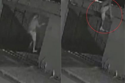 Momento em que o suspeito escala o muro para pular para dentro da casa (Imagem: Divulgação)