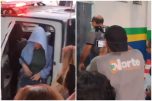 Suspeita e suspeito chegam à delegacia ao serem detidos em operação de combate ao crime organizado (Imagens: WhatsApp/Reprodução)