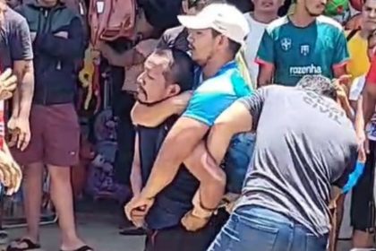 O suspeito tentou resistir à prisão, chegou a agredir um policial civil e foi imobilizado (Foto: WhatsApp/Reprodução)
