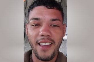 Renildo da Silva Pimentel, 25 anos, estava pendurado em uma corda amarrada em uma porta de ferro (Foto: WhatsApp/Reprodução)