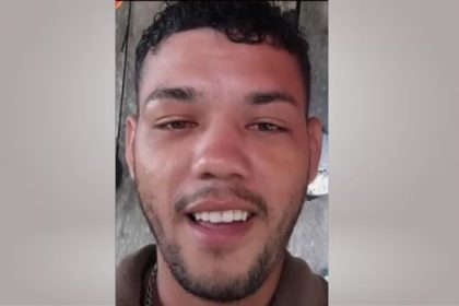 Renildo da Silva Pimentel, 25 anos, estava pendurado em uma corda amarrada em uma porta de ferro (Foto: WhatsApp/Reprodução)